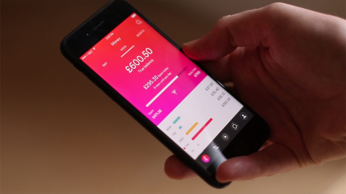 Image of mobile financial app in hand